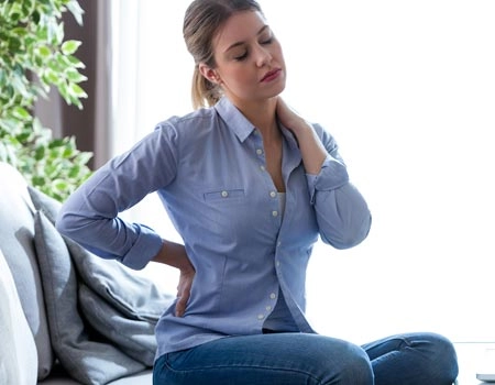 Chiropractic Baltimore MD Lady With Back Pain